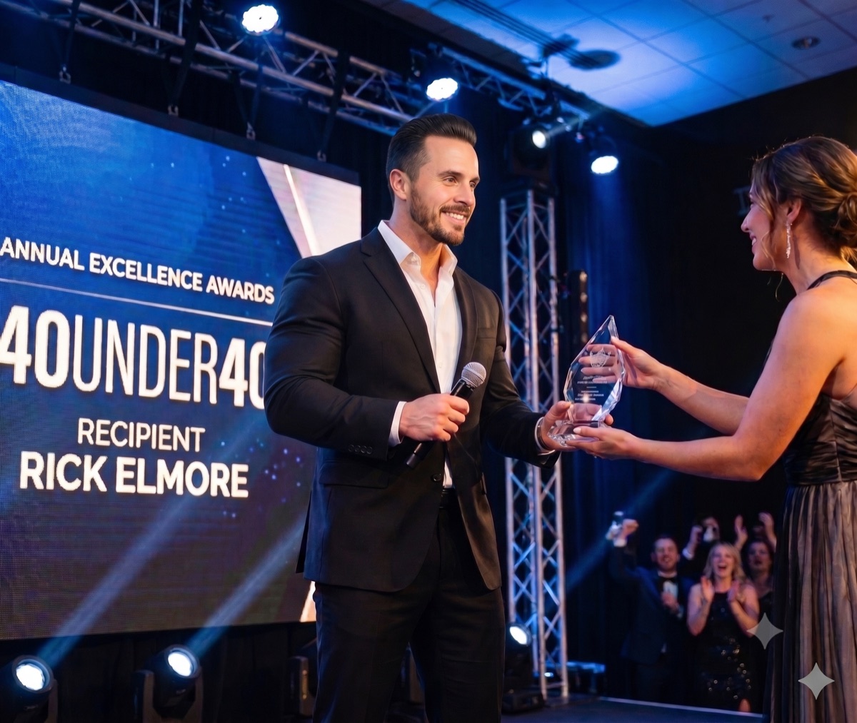 Rick Elmore receiving the 40 Under 40 award